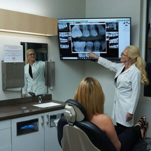 Dr Cohan reviewing dental treatment plan on screen honest dentist Summerlin Dental Solutions Las Vegas transparency